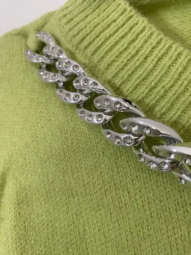 Sweater  Tejido Con Hombreras Y Cuello Cadena